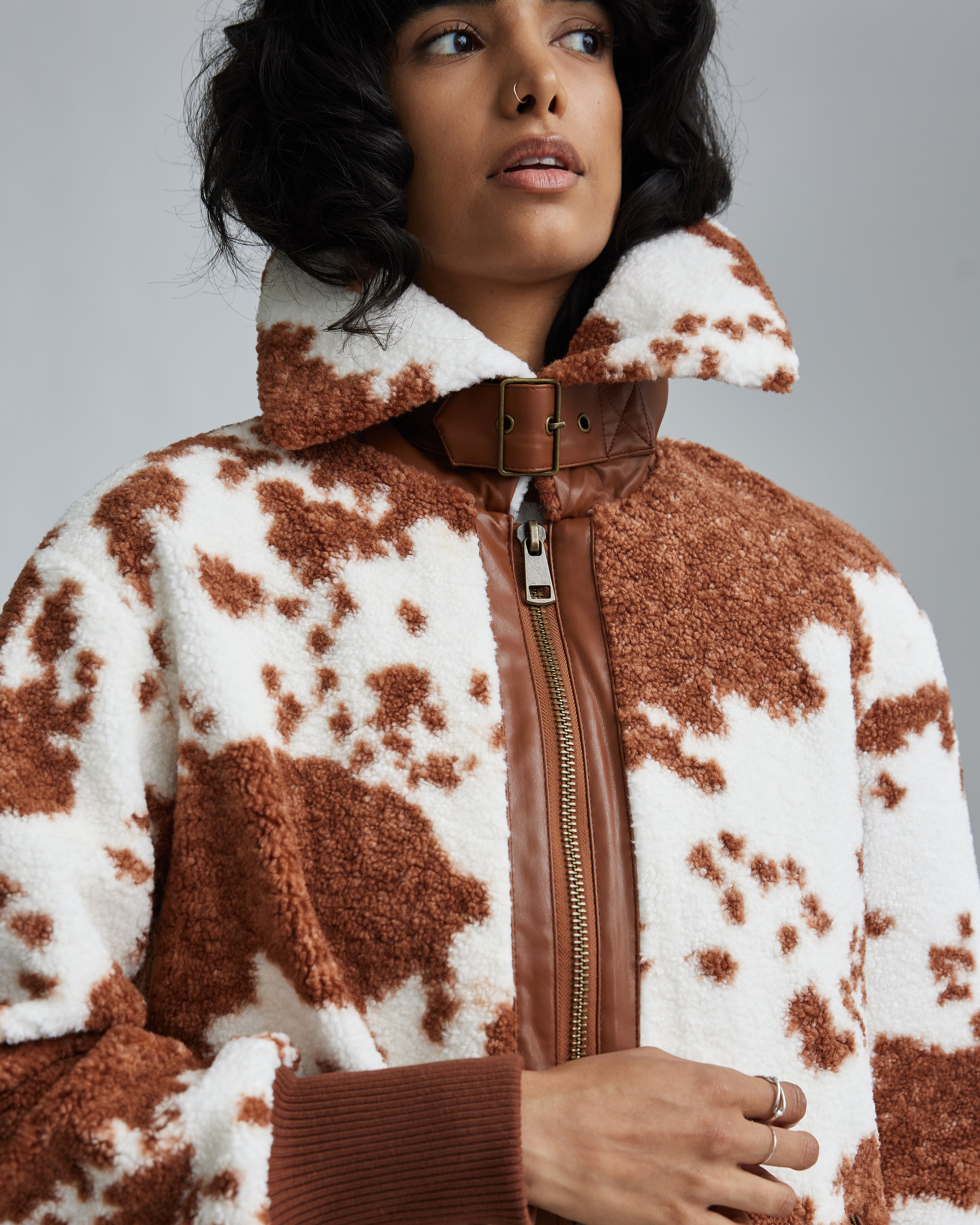 brown cow print fur coat